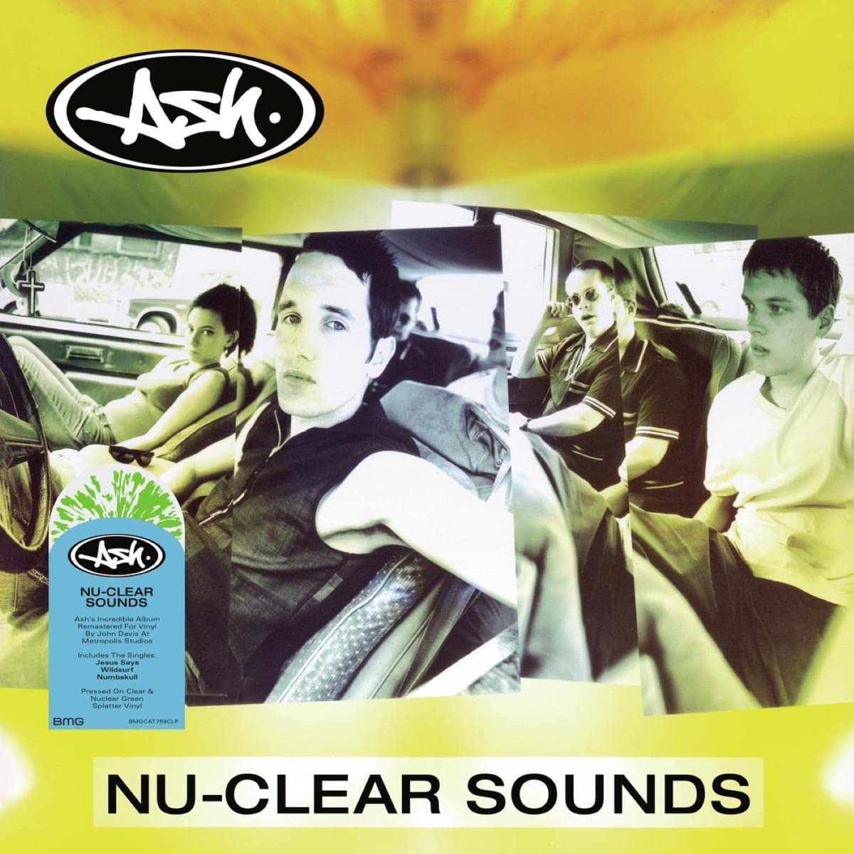 "Album cover with band members in a car, green splatter vinyl label visible."