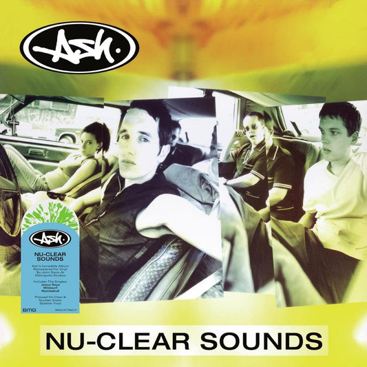 "Album cover with band members in a car, green splatter vinyl label visible."