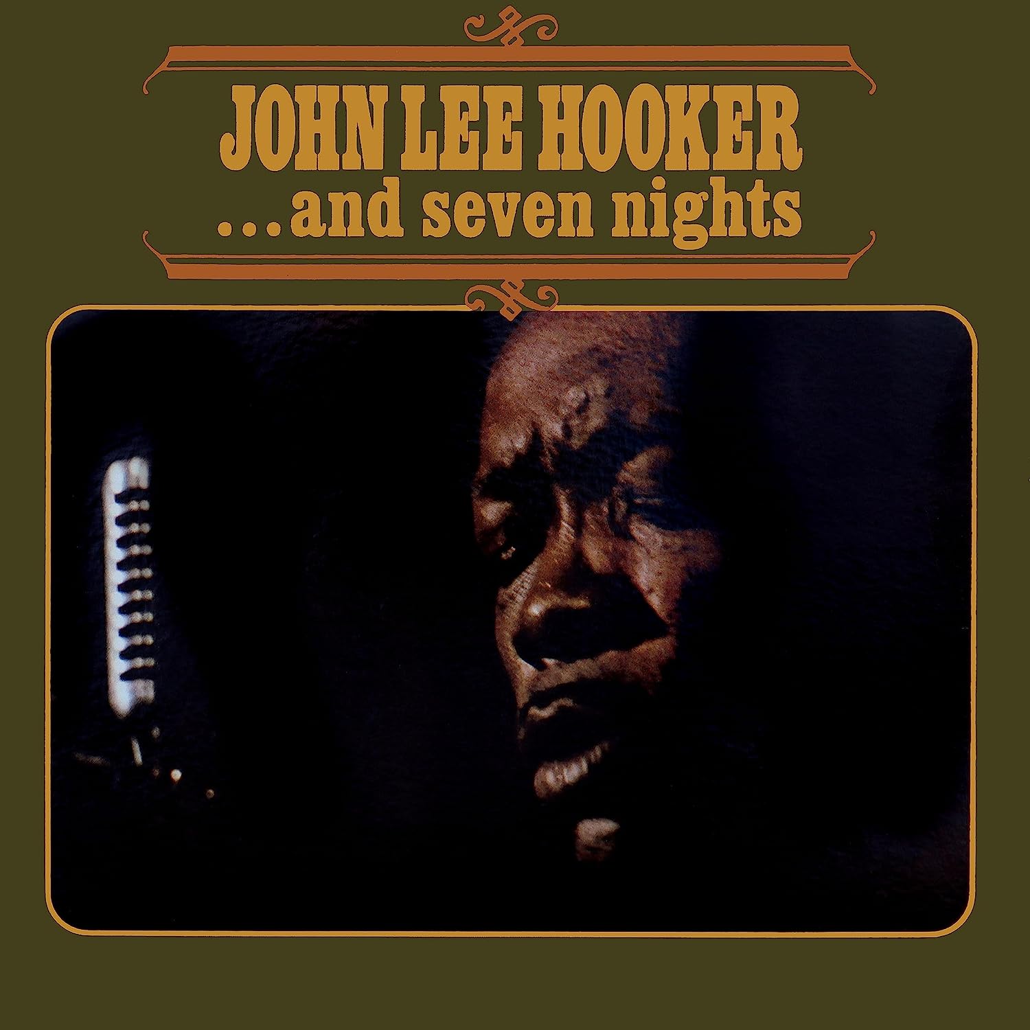 "Vinyl album cover with John Lee Hooker's portrait and title text."