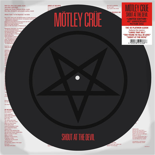 "Vinyl record with a black disc and red text, featuring a pentagram design."