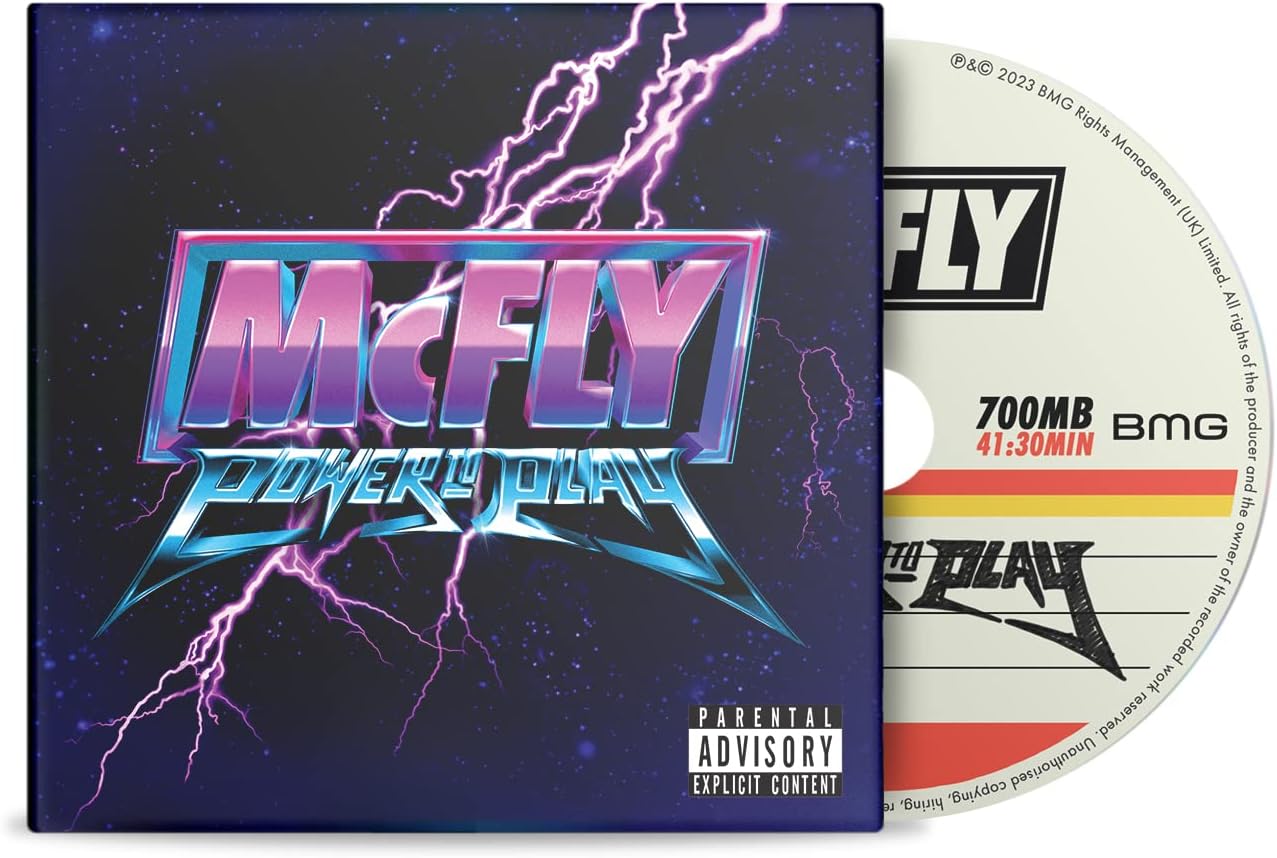 "CD case with 'McFly - Power to Play' title, lightning bolts, and a visible CD."