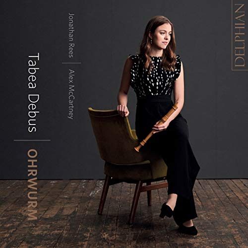 CD album cover featuring a woman holding a recorder, sitting on a chair.