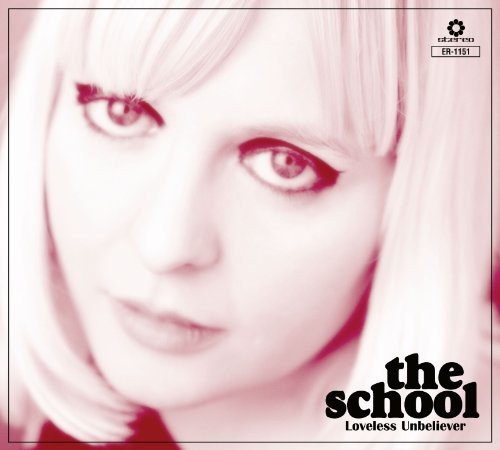 Album cover featuring a close-up of a woman's face with blonde hair and red eyes.
