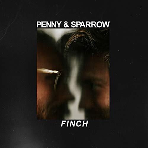"Album cover with two men's faces, one smoking, on a black background."