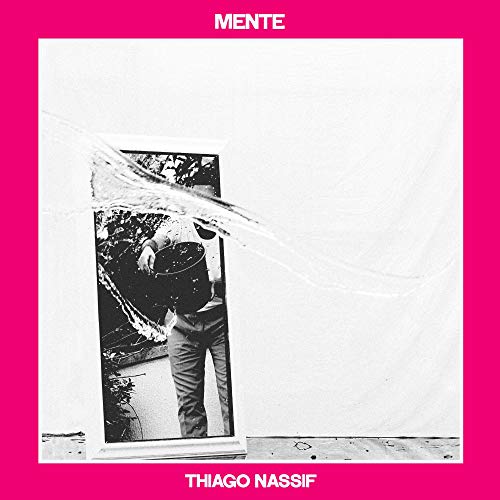 Album cover with black and white photo of man in broken mirror, pink border.