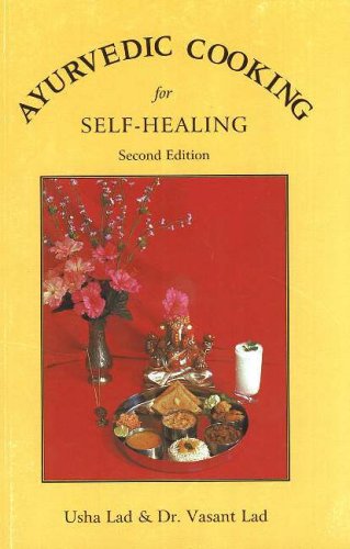 "Book cover with yellow background, red inset showing a meal and flowers."