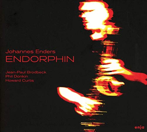 "Album cover with abstract, glowing figure holding trumpet against a black background."