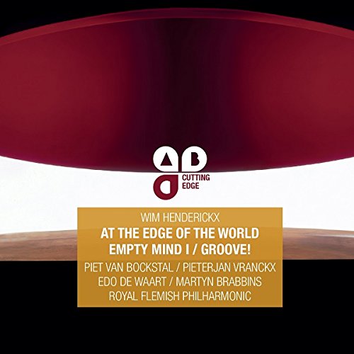 "CD cover with red drum and white and orange text on a black background."