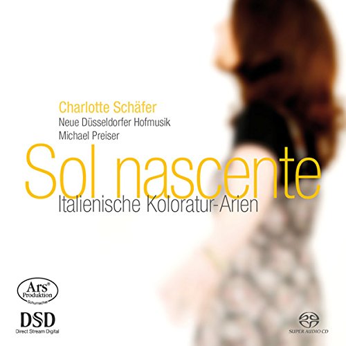 "CD cover with a blurred woman's portrait and yellow and black text on white background."