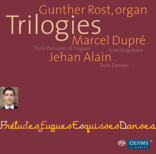 Red CD cover with beige and orange text, featuring a small musician portrait.