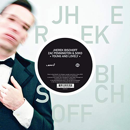 Vinyl record cover featuring a man in a tuxedo and a black record label.