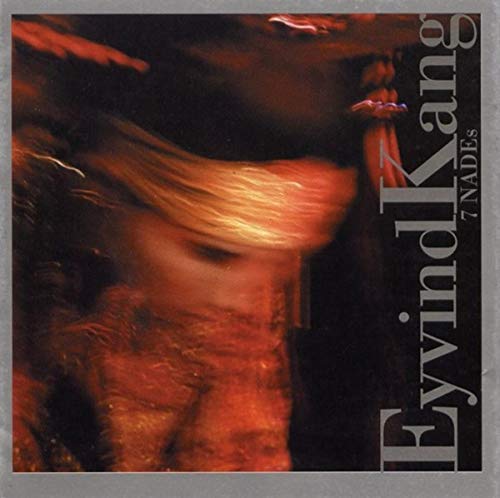 "Album cover with blurry red image and artist name 'Eyvind Kang' in white text."