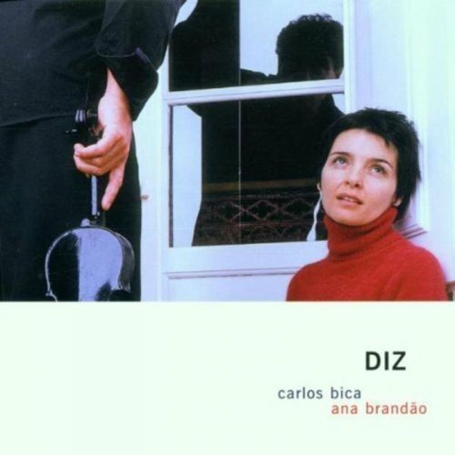 "CD cover with a man holding a violin and a woman in a red turtleneck."