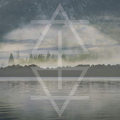 A misty lake scene with a white geometric symbol overlay.