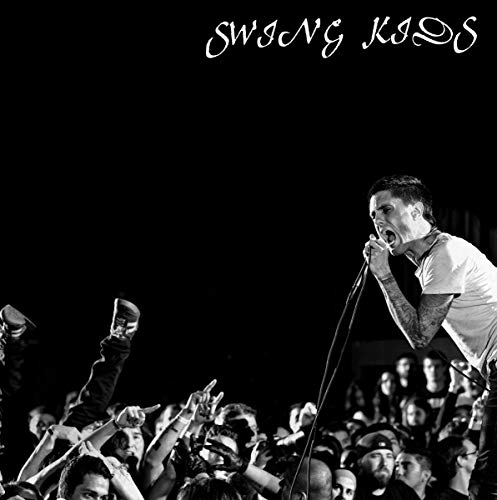 Black and white image of a singer performing to a crowd, with "Swing Kids" text.