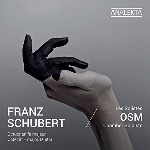 "CD cover with a hand holding a shadow hand, Franz Schubert and OSM text."