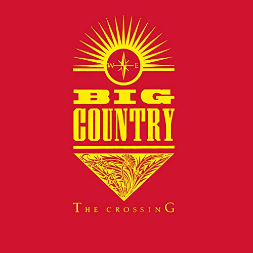 Red vinyl album cover with yellow text and graphics, partially covering a black vinyl record.