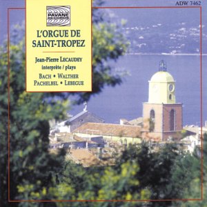 CD cover featuring a church by the sea with a yellow title box.