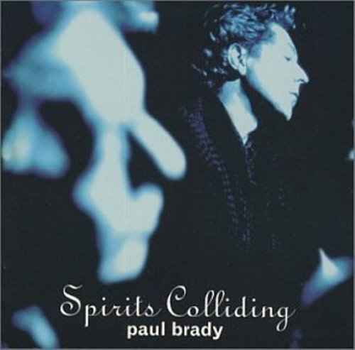 Album cover with a man in dark clothing and blurred hands in the foreground.