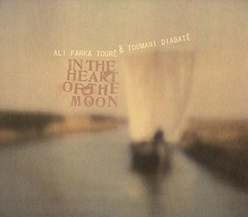 "CD album cover with a boat on a river, brown text overlay."
