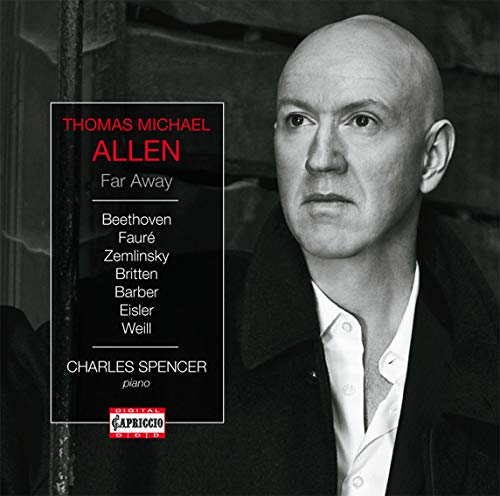 "CD cover featuring a black-and-white photo of a bald man in a suit."