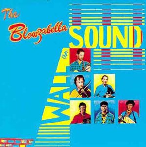 The image is a CD cover featuring a blue background with a band's image.