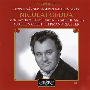 Red CD cover with black and white portrait of a man in a tuxedo.