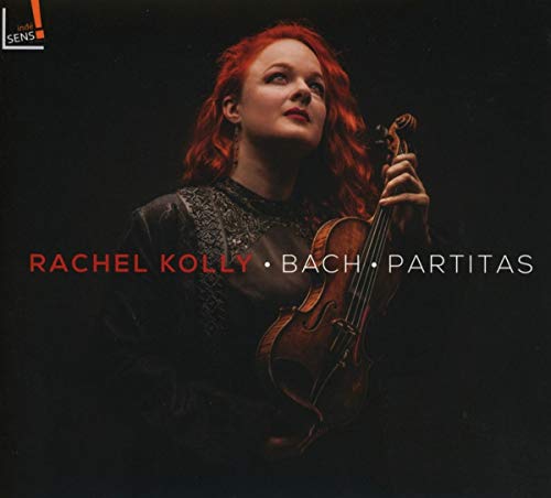 CD cover featuring a red-haired woman holding a violin against a dark background.