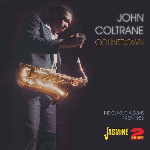 "Album cover featuring John Coltrane playing saxophone, with title and logo."