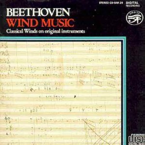A CD cover featuring Beethoven's Wind Music with sheet music on a black background.