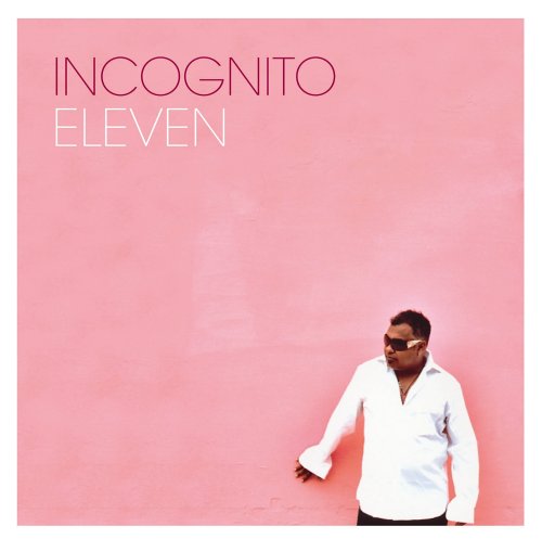 Album cover with man in white shirt against a pink background.