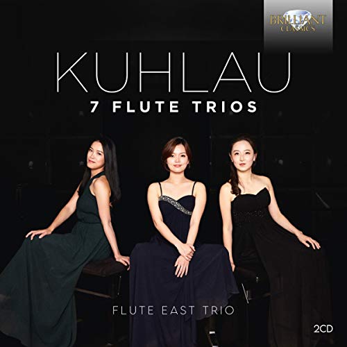 CD cover featuring three women in formal dresses against a dark background.