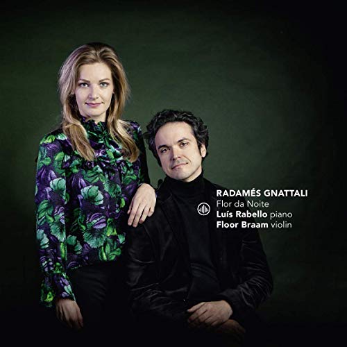 CD cover featuring a man and woman posing together against a dark green background.