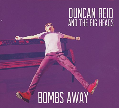 Album cover with man jumping against purple background, text "Duncan Reid and the Big Heads".