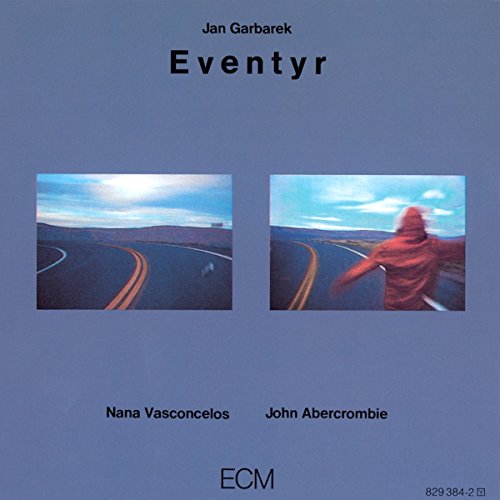 "Album cover with blue background, two road images, and musician names."