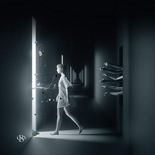 A vinyl record cover featuring a woman in a dark hallway.