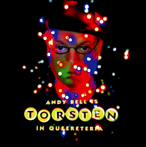 Man's face with multicolored lights on black background, text "Andy Bell vs Torsten in Queereteria".