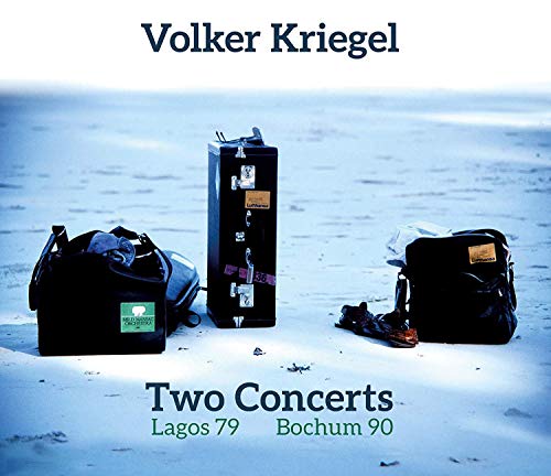 "CD cover with guitar cases on a sandy surface, artist and title text."
