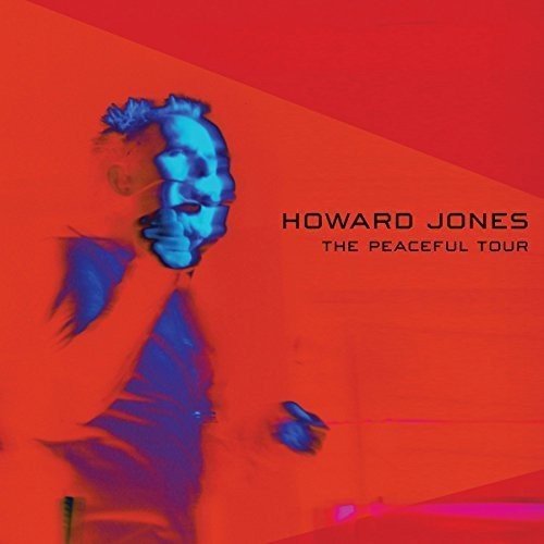 "Vinyl record cover featuring a blue-toned man on a red background, titled 'The Peaceful Tour'."