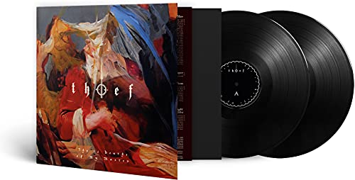 “Thief” vinyl album cover with abstract figure, two black vinyl records.