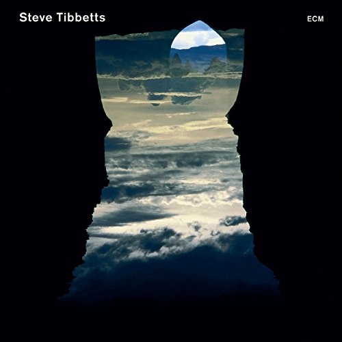 "Album cover with cloudy sky image cut out from a black background."