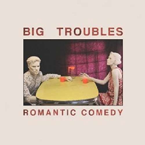 "CD cover with man and woman reaching for a table."