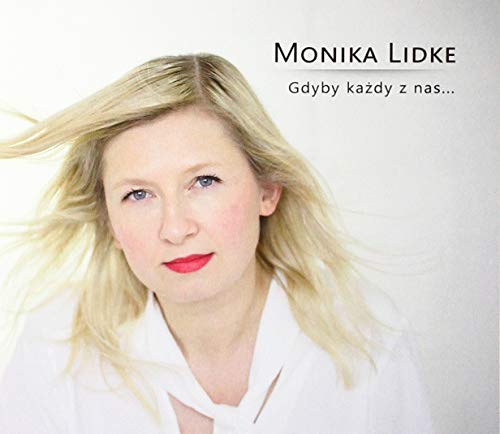 A blonde woman in a white shirt on a CD album cover.