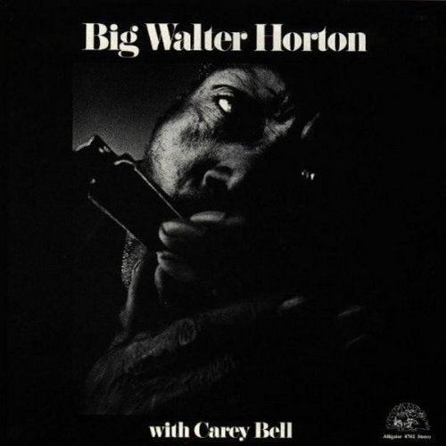 Black-and-white album cover with a man playing a harmonica, titled "Big Walter Horton".