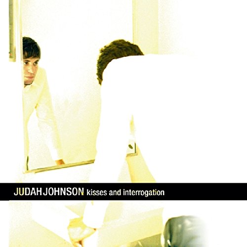 "Album cover with man in white shirt, reflected in a mirror, with title text."