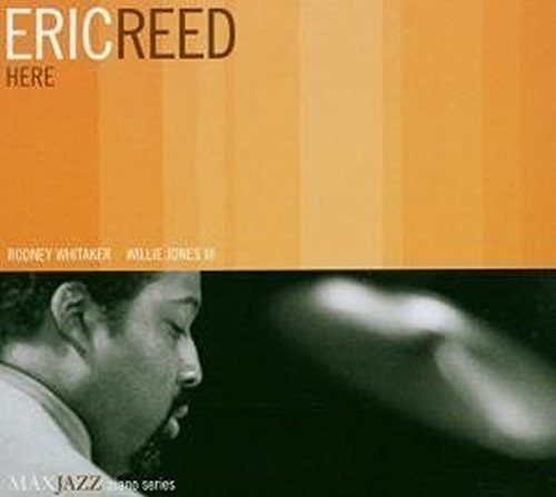 "Album cover with a man playing piano, orange and black background, artist's name visible."