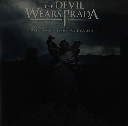 "Album cover art featuring a statue of an angel surrounded by skulls."