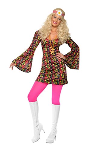 "Woman in 1960s hippie costume, floral dress, pink leggings, white boots, and headband."