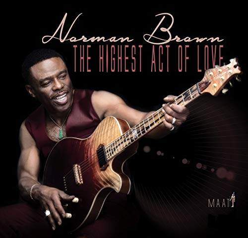 Album cover with musician Norman Brown holding a guitar against a black background.