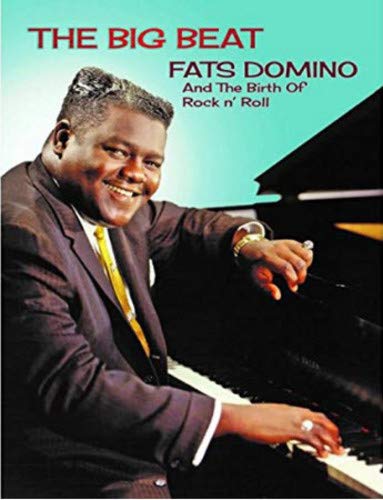DVD cover featuring Fats Domino playing piano, smiling, with red title text above.
